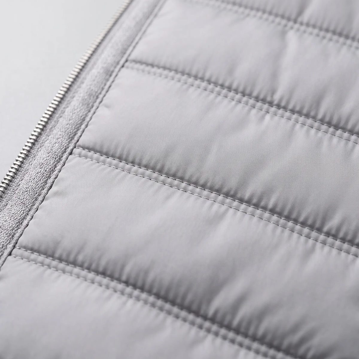 Modello Trapuntato con Maniche in Maglia e Zip